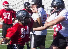The SUU football team prepares for the 2013 season with its first day of practice. 